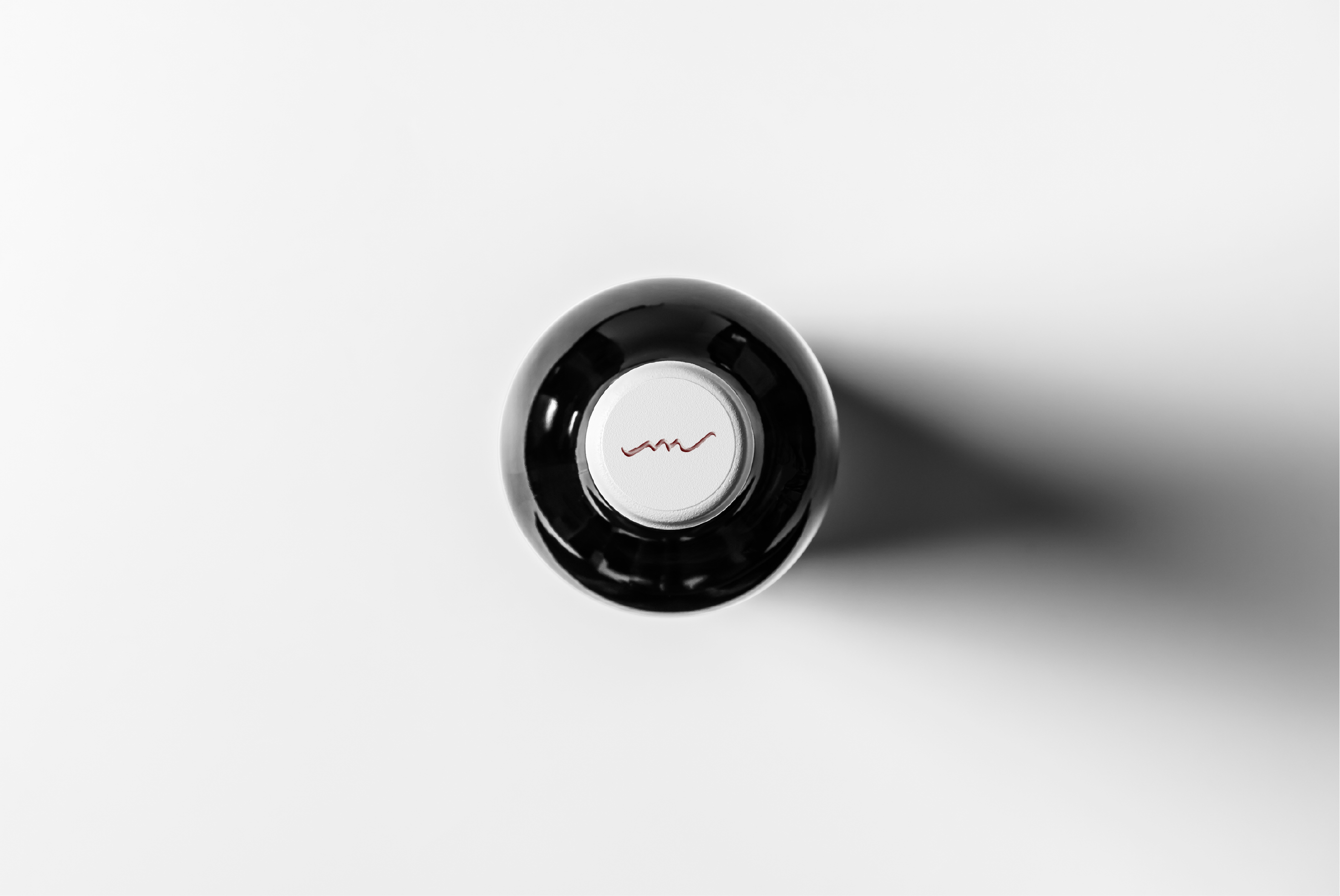 Merrilee cork top from above — dark bottle